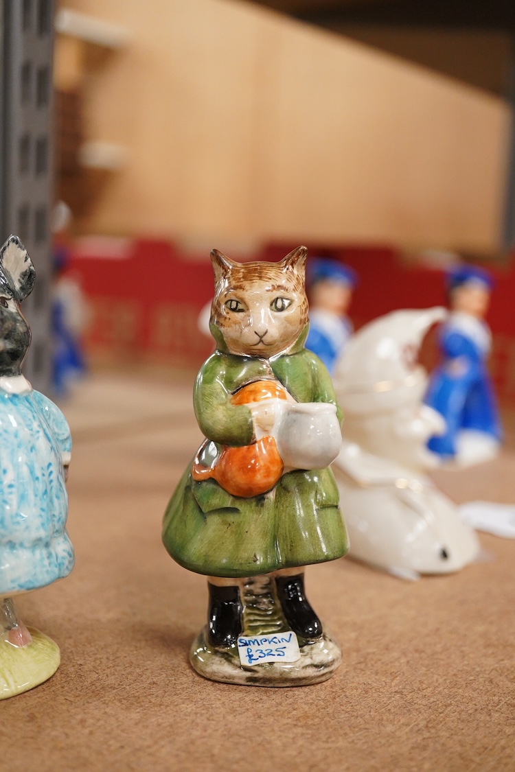 Four Beatrix Potter Beswick figures; Simpkin, Ginger, Miss Moppet and Pig-Wig, largest 10cm high